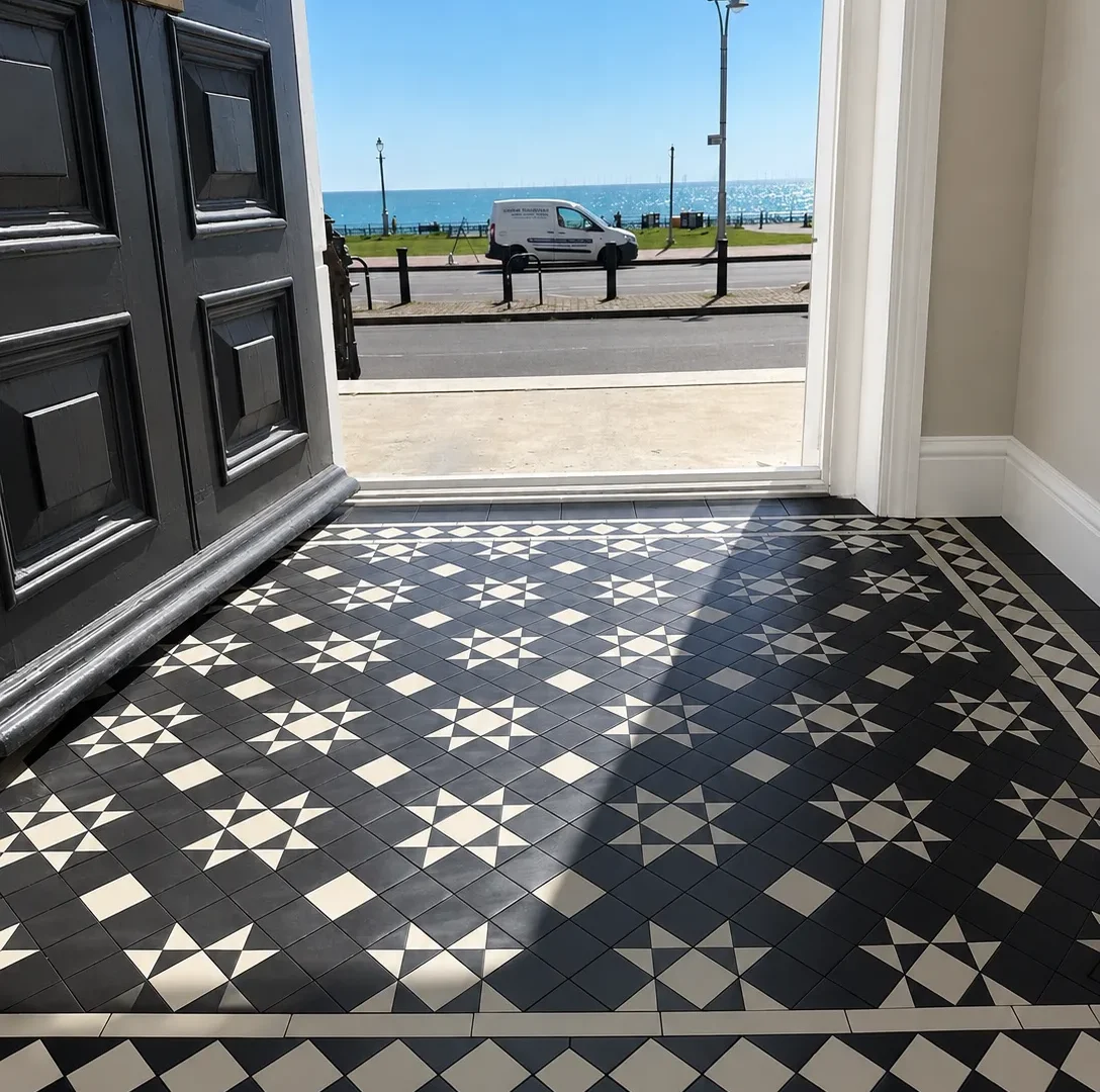 Original Victorian style black and white tiled entrance with sea view