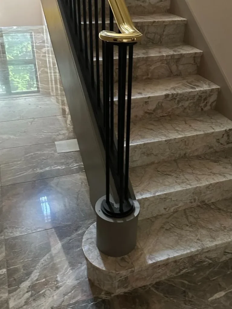 Custom marble staircase and polished stone floor