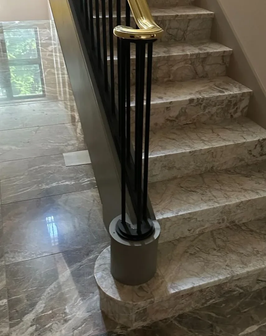Custom marble staircase and polished stone floor